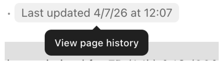 ClickUp Doc showing the Last Updated option used to access page version history.
